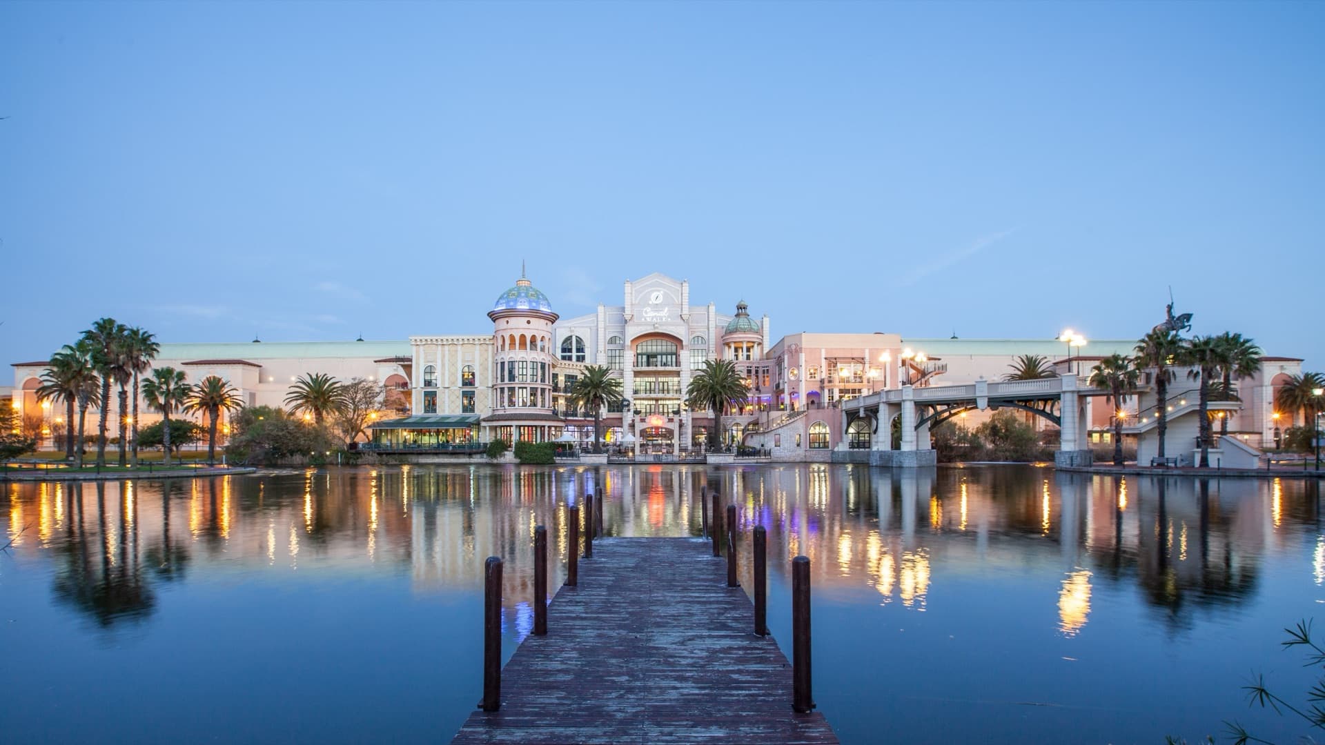 Canal Walk Shopping Centre at dusk, Century City – moments from Colosseum Hotel