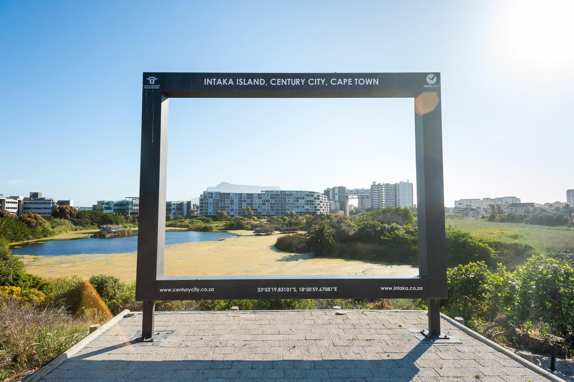 The Intaka Island wetland reserve viewing frame, with Table Mountain in the distance